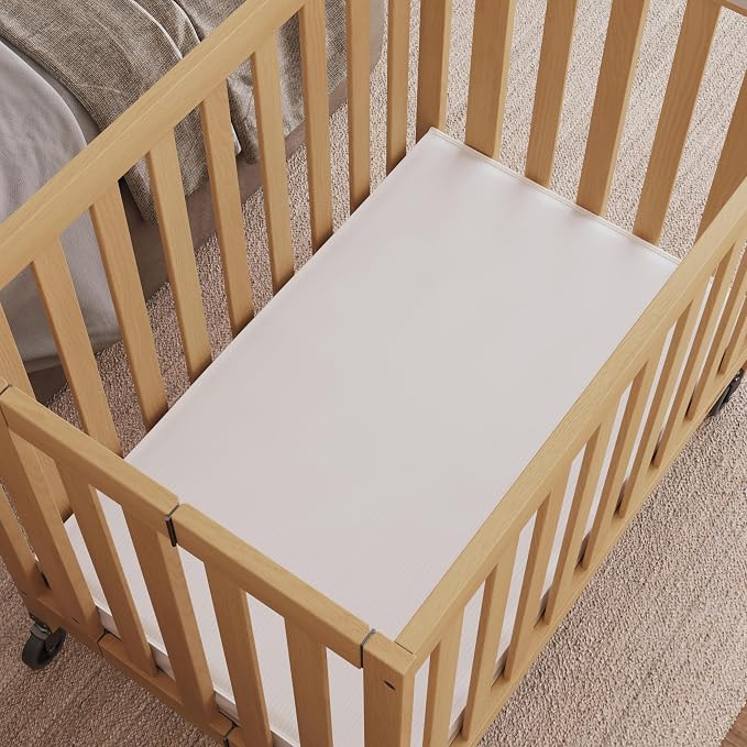 Foundations Travel Sleeper Wood Compact Folding Crib - Image 7